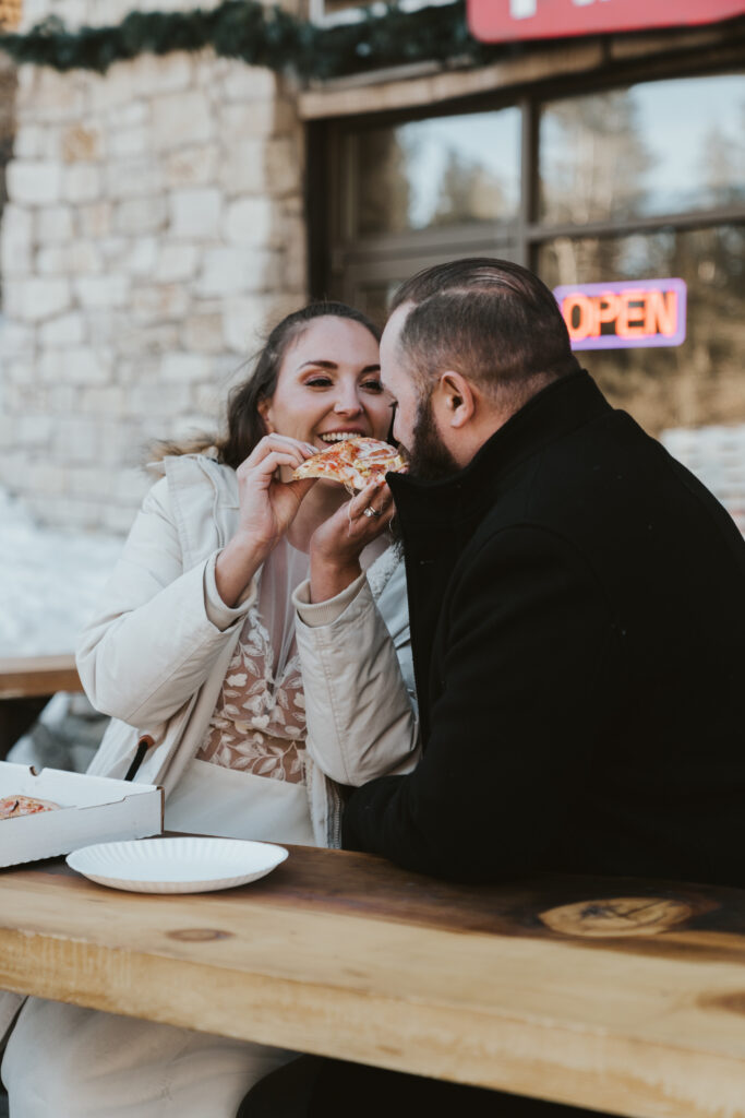 Bride and groom eat pizza after elopement in mammoth lakes california
